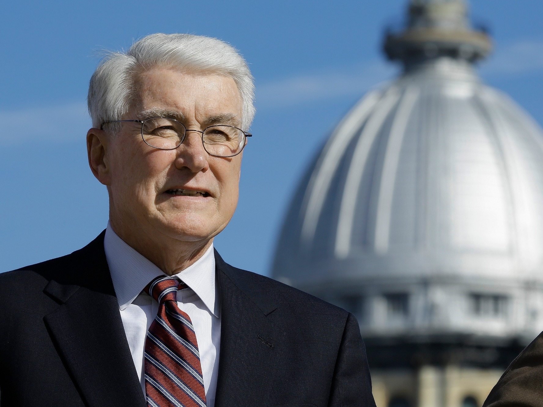 Jim Edgar standing in front of capitol