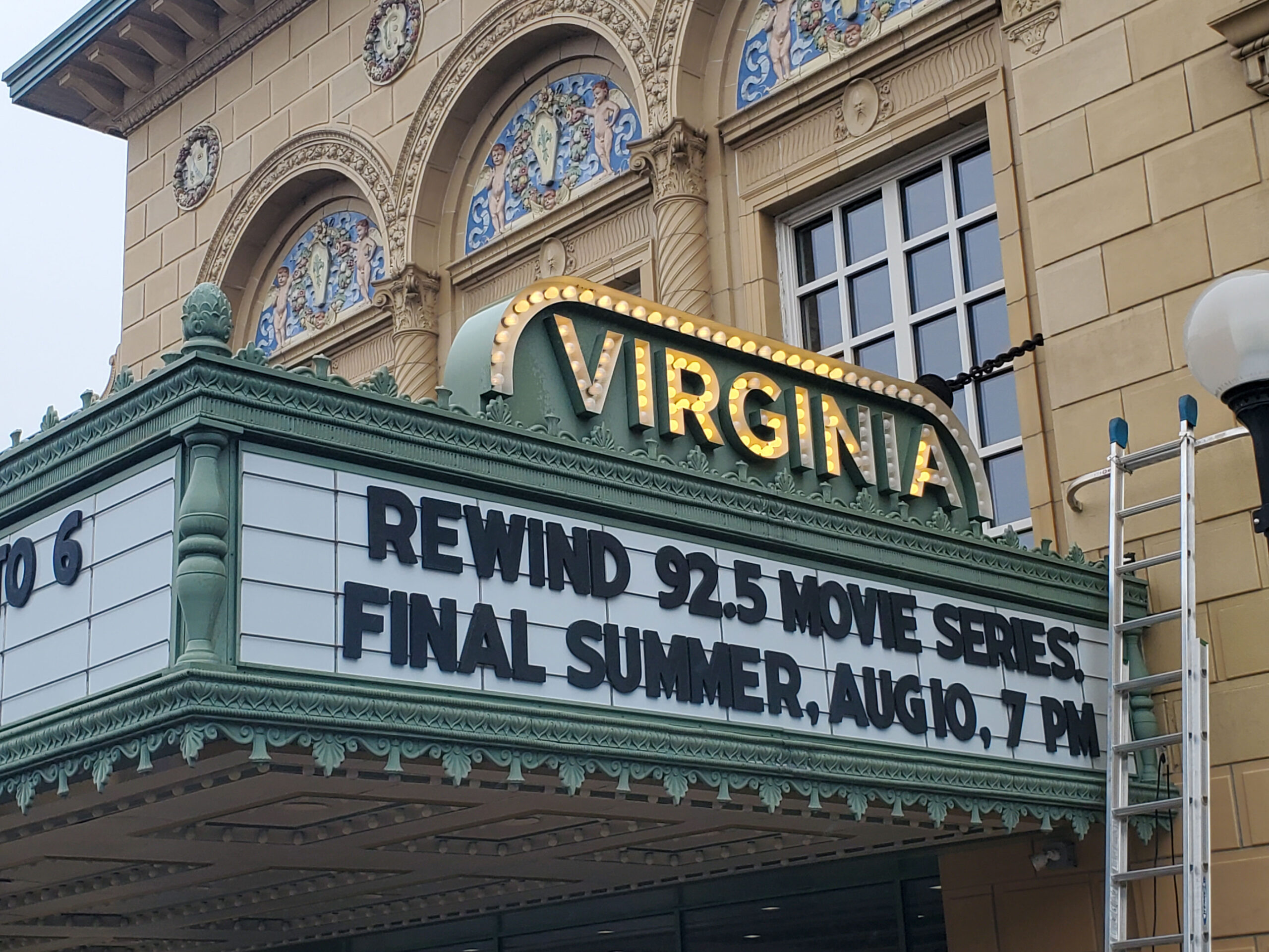The Virginia Theater marquee reads "REWIND 92.5 MOVIE SERIES FINAL SUMMER, SUG. 10, 7PM."