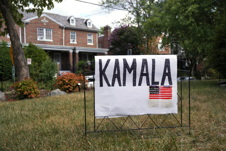 campaign sign in front of a home
