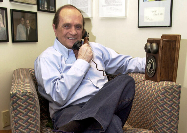 man talking on telephone