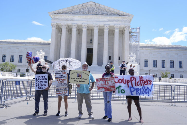 sign-holders in front of the US supreme court