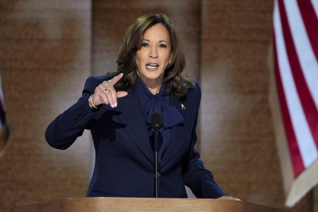 Kamala Harris speaking at a podium