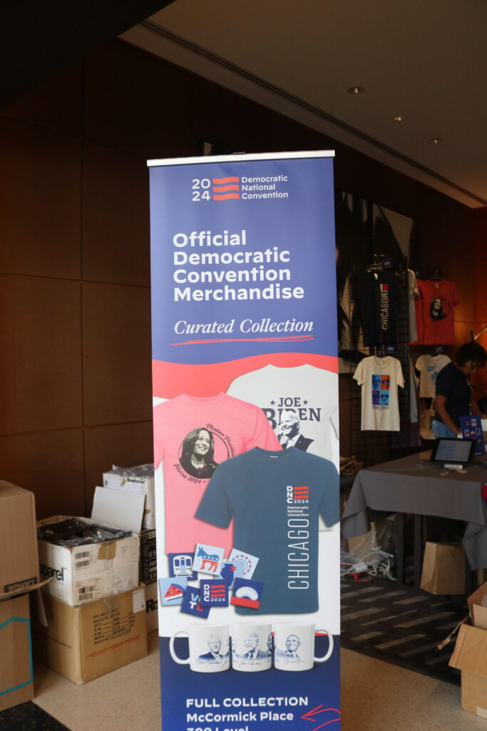 sign for merch table for DNC