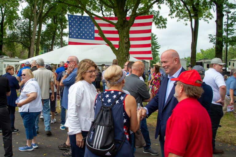 People speaking at the Illinois State Fair.