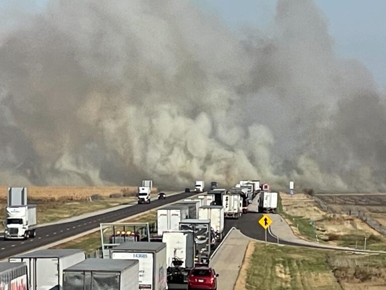 I-74 reopens after massive field fire