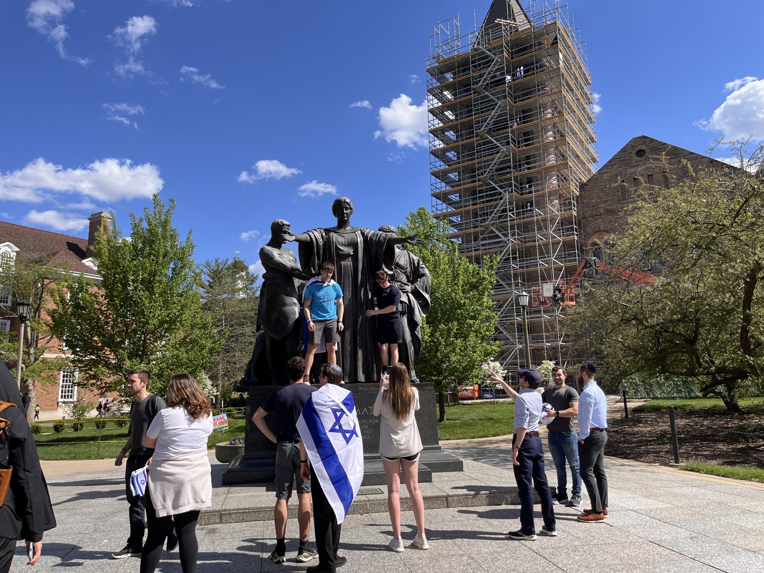 people gathered around statue