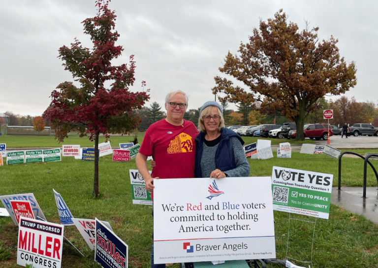 Voters with Braver Angels promote a message of unity on Election Day in Champaign County