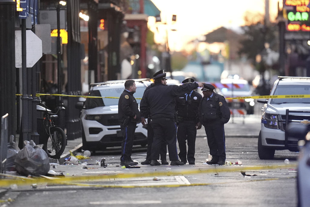 police officers standing in crime scene