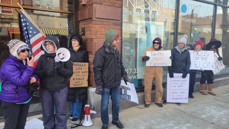 rally against Trump cuts to federal agencies