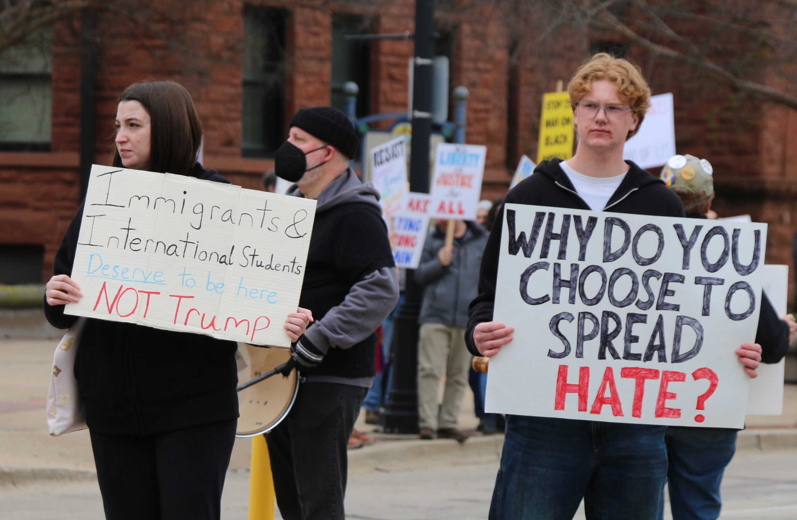 demonstrators holding signs