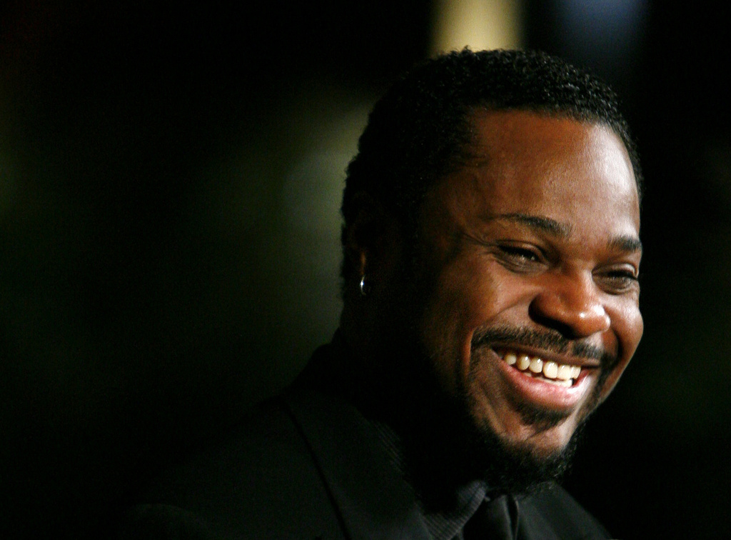 Malcolm-Jamal Warner smiling