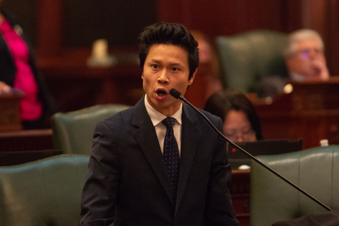 man speaking at IL general assembly