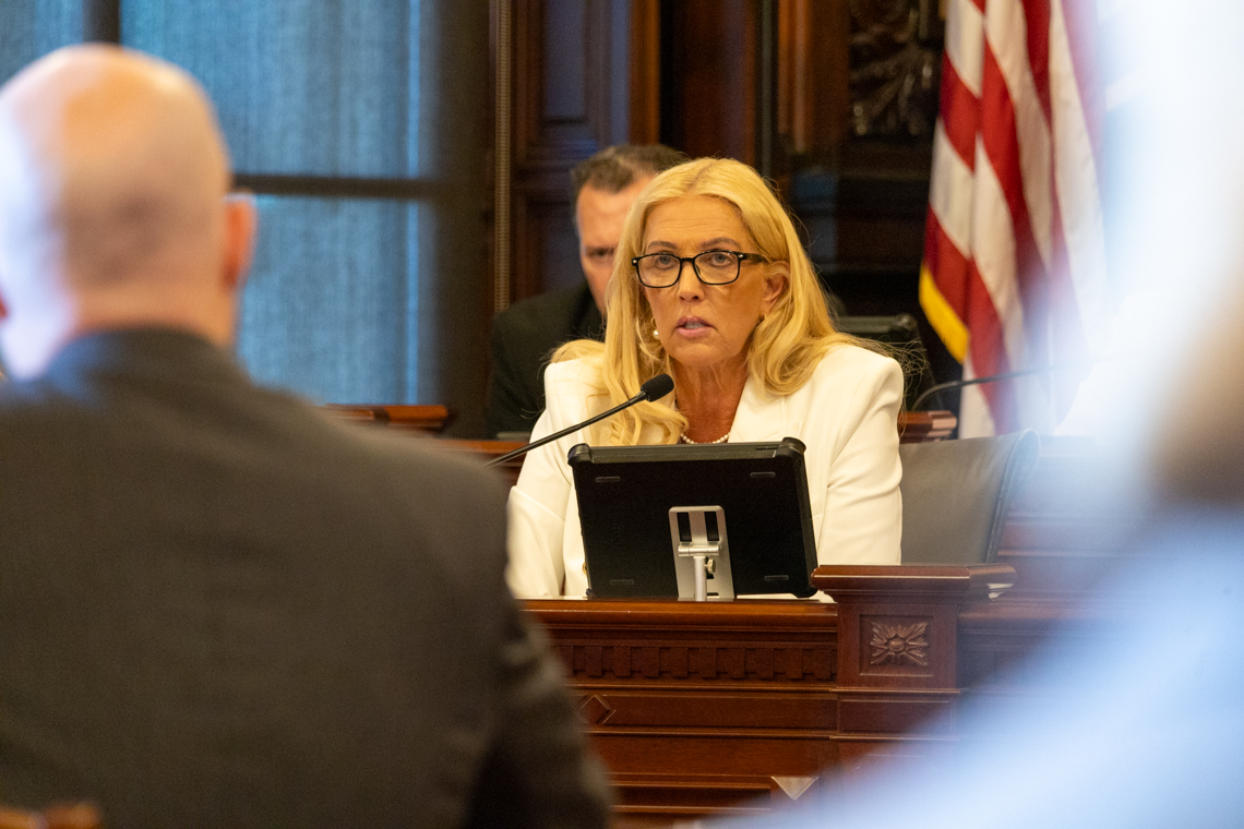 woman speaking in legislature