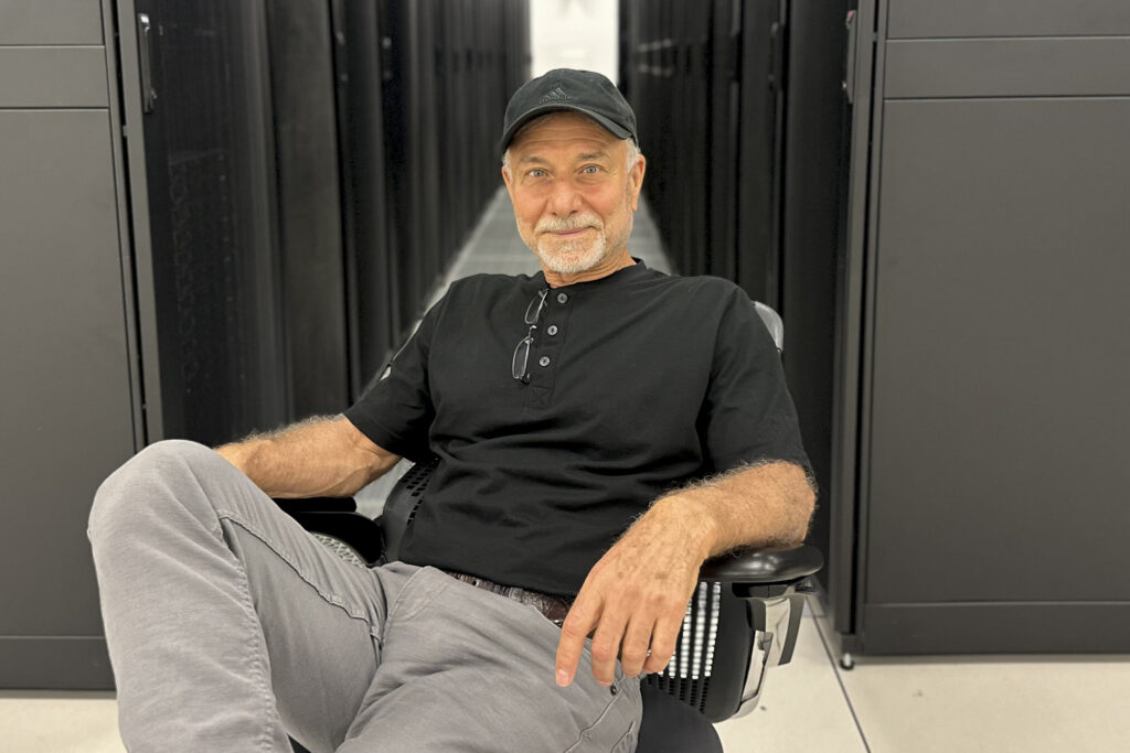 Mohammad Rantisi sits in a chair