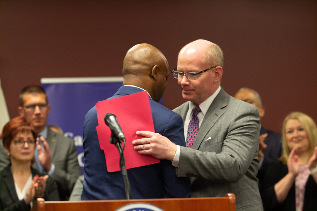 two politicians embracing