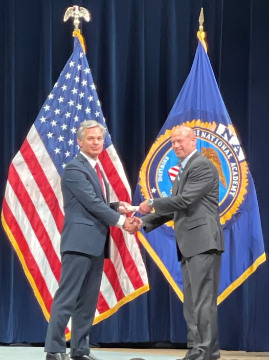 Mark Pingsterhaus and Christopher Wray,