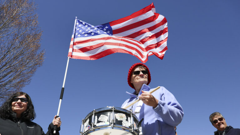A person and an American flag