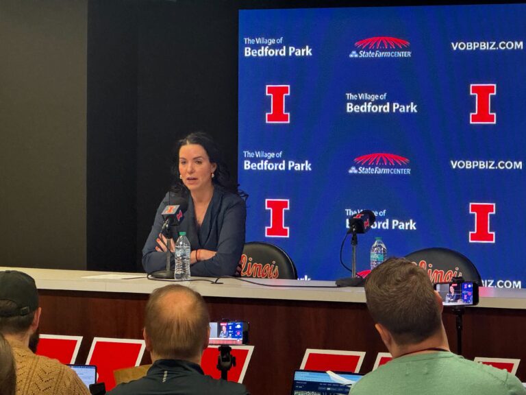 Shauna Green in front of a microphone.
