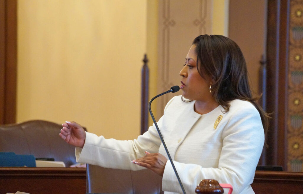 woman speaking at podium