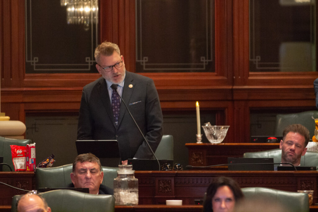 man speaking in legislature