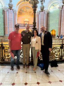 Advocates for safer streets at the Illinois Statehouse with State Rep. Jennifer Sanalitro