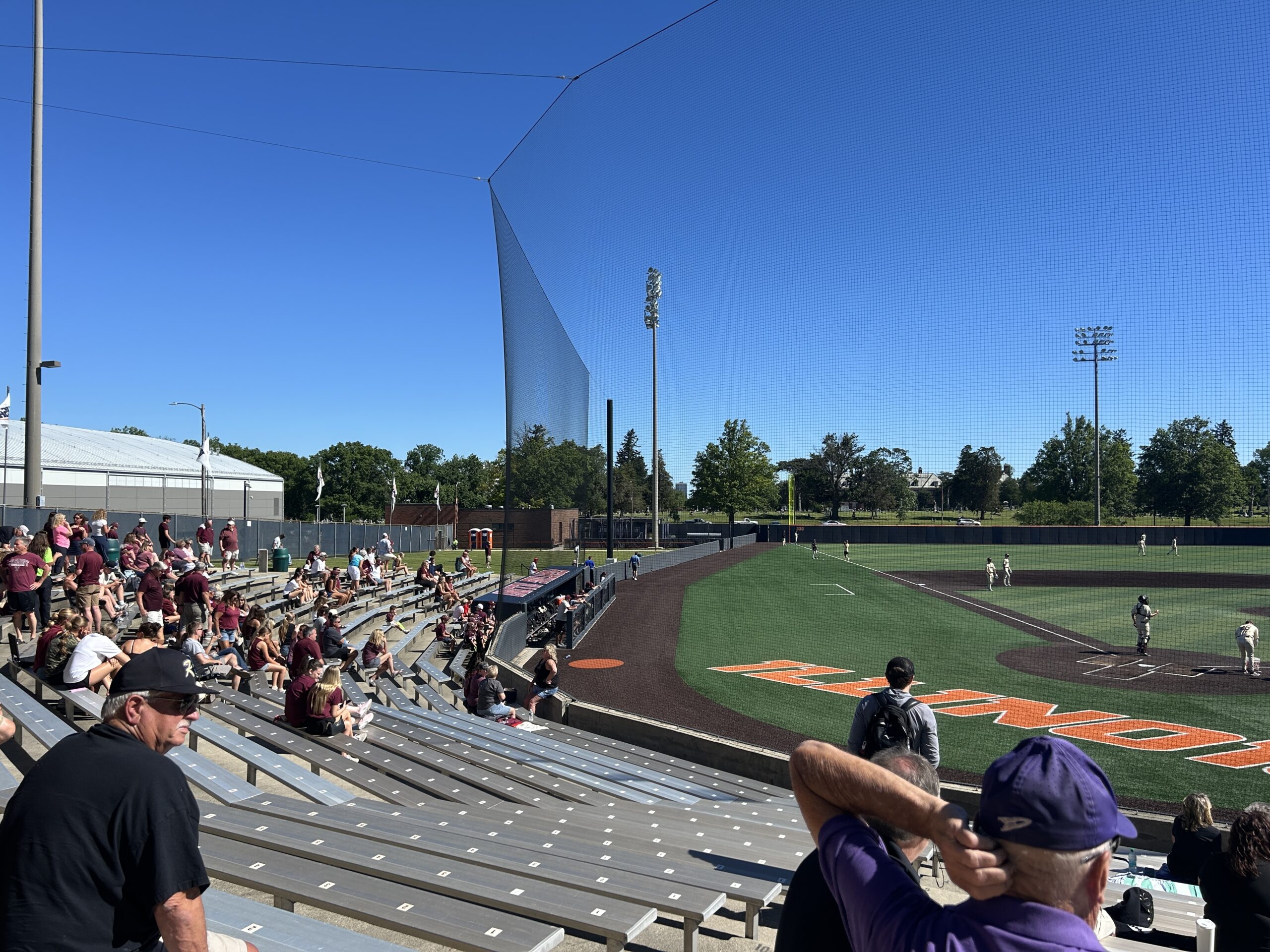 Families sit in stands at Illinois Field