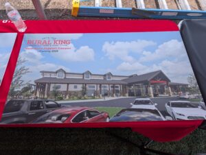 A rendering depicts the Rural King event center.