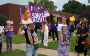 Protesters outside the Illinois Prisoner Review Board building.