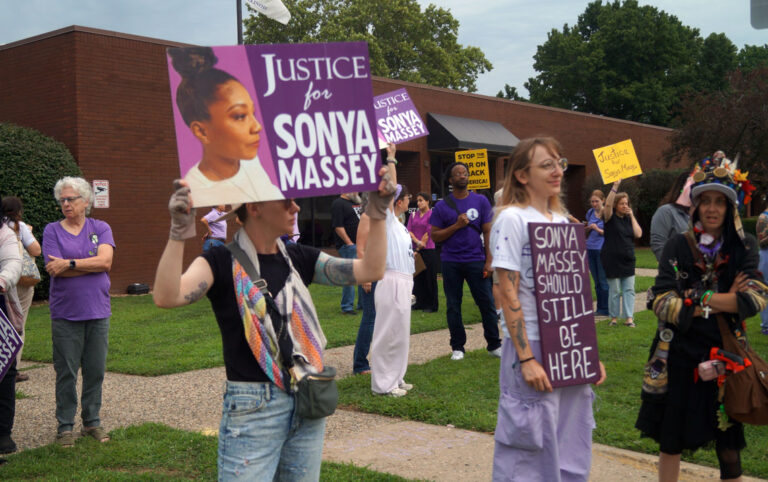 Protesters outside the Illinois Prisoner Review Board building.