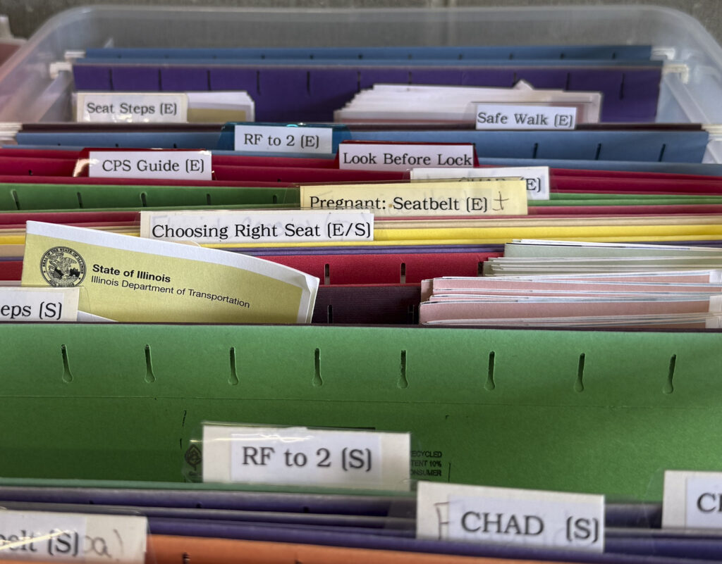 hanging files of many colors in a drawer